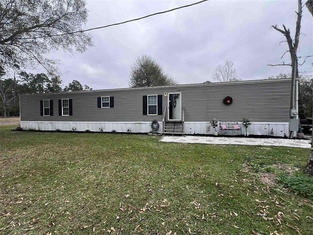 4.4 Acres of Land with Home for Sale in Sulphur, Louisiana
