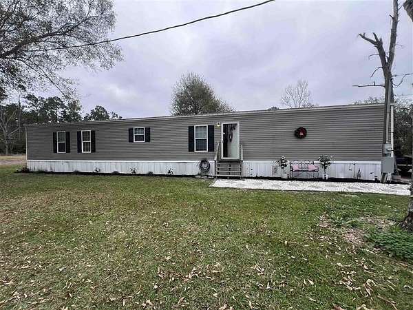 4.4 Acres of Land with Home for Sale in Sulphur, Louisiana