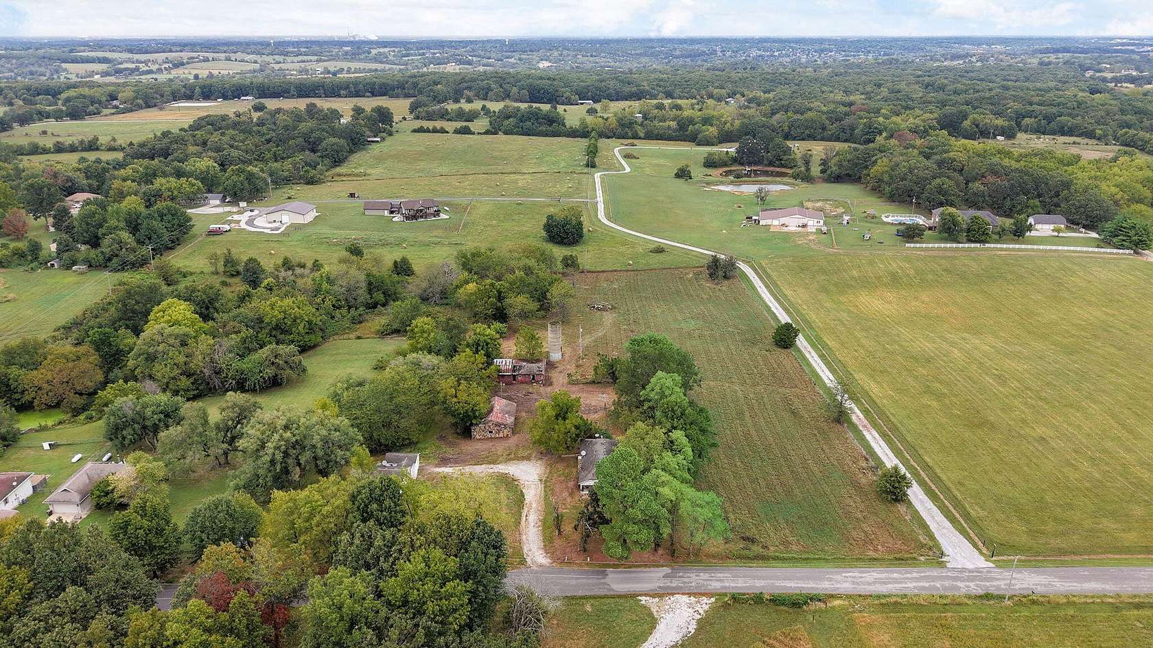 5.9 Acres of Land with Home for Sale in Nixa, Missouri