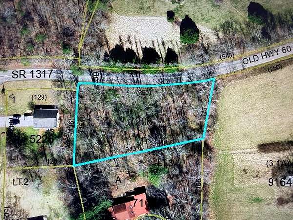 0.84 Acres of Residential Land for Sale in Millers Creek, North Carolina