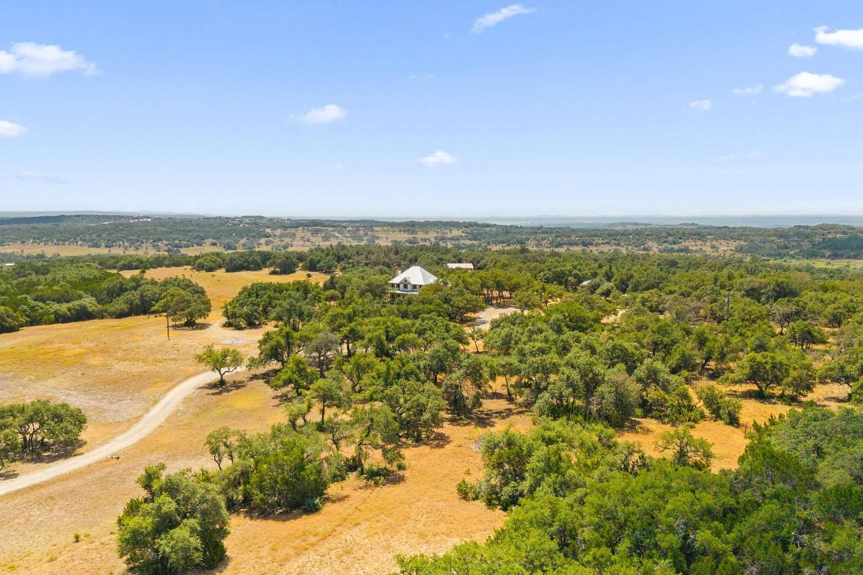 60.6 Acres of Land with Home for Sale in Blanco, Texas