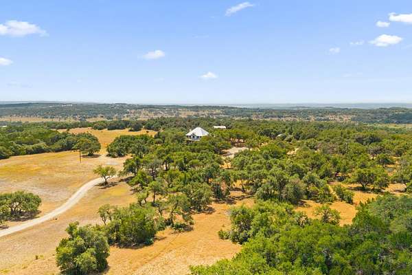 60.6 Acres of Land with Home for Sale in Blanco, Texas