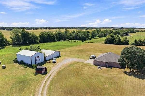 10 Acres of Recreational Land with Home for Sale in Collinsville, Oklahoma