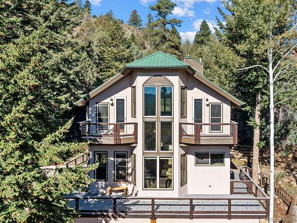 10.5 Acres of Recreational Land with Home for Sale in Glen Haven, Colorado