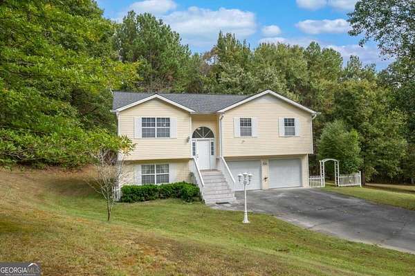 4.75 Acres of Land with Home for Sale in Sugar Valley, Georgia