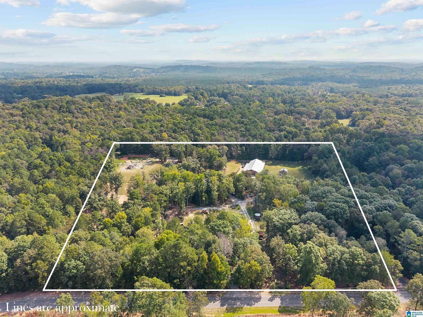 10.8 Acres of Land with Home for Sale in Pell City, Alabama