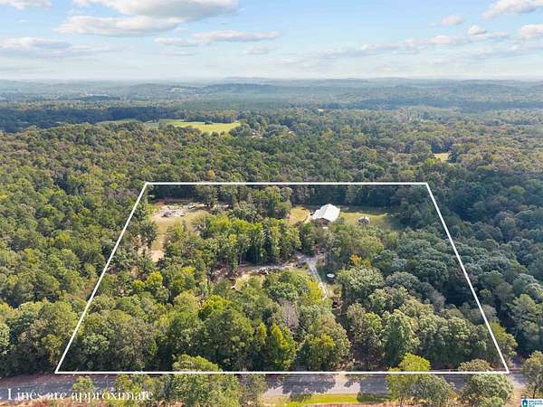 10.8 Acres of Land with Home for Sale in Pell City, Alabama