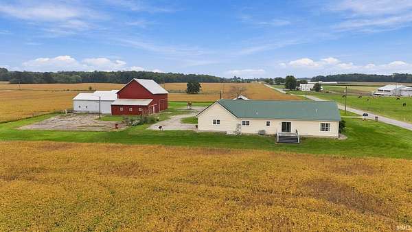 80 Acres of Agricultural Land with Home for Sale in South Whitley, Indiana