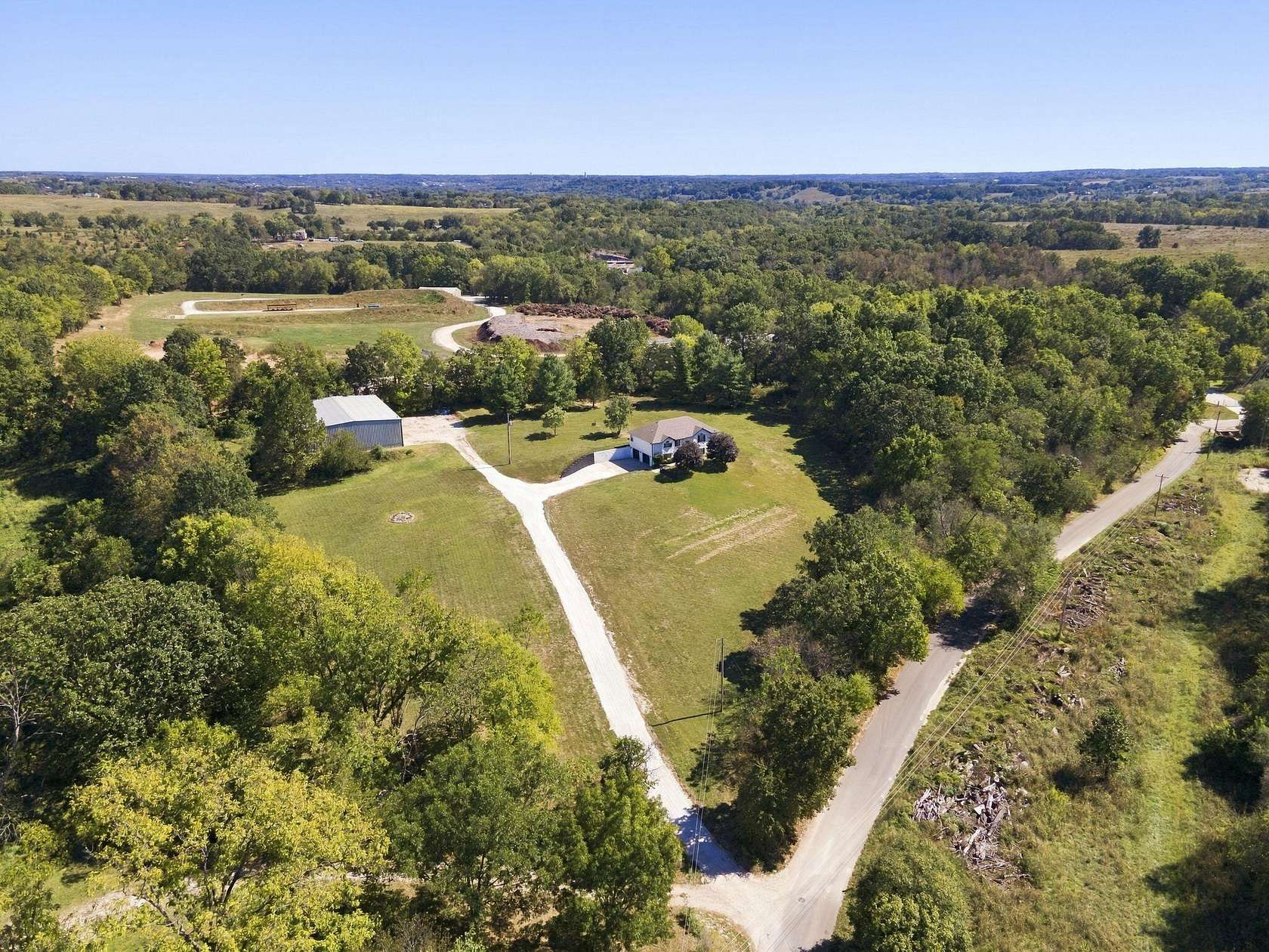5.83 Acres of Land with Home for Sale in Nixa, Missouri