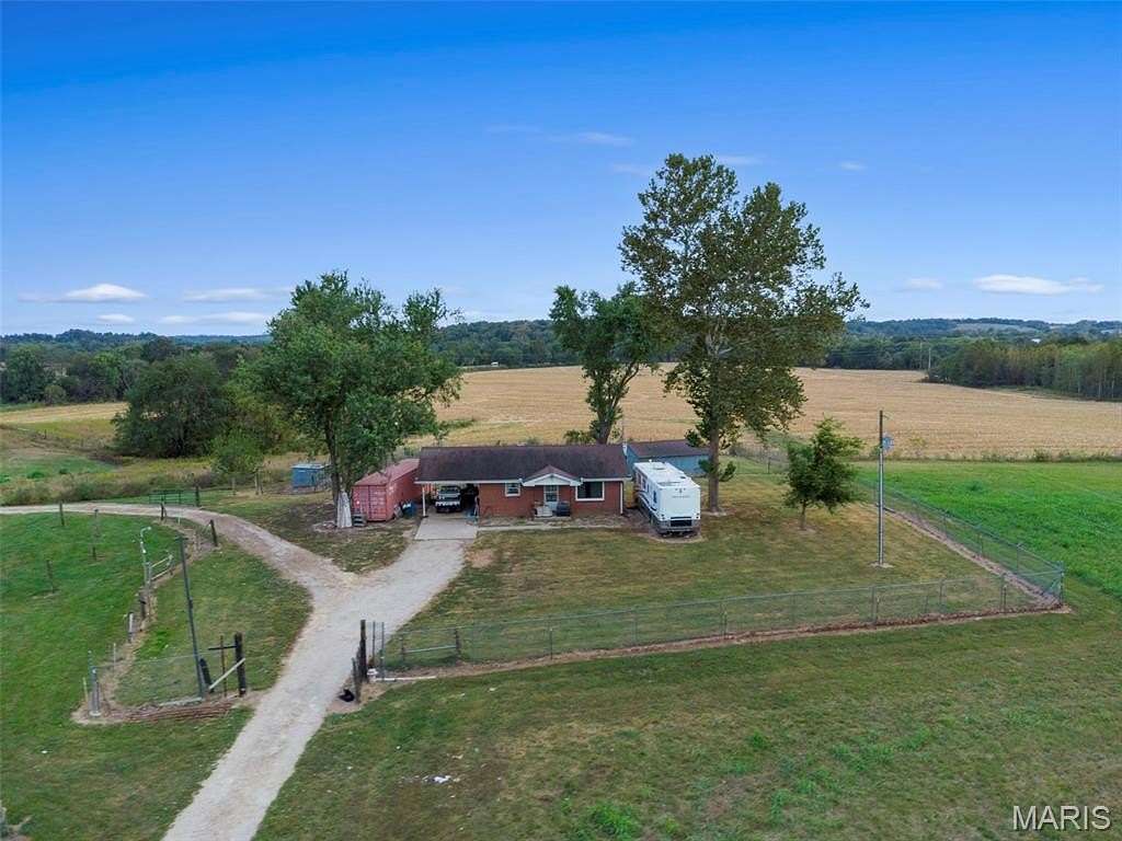 16.7 Acres of Land with Home for Sale in Burfordville, Missouri