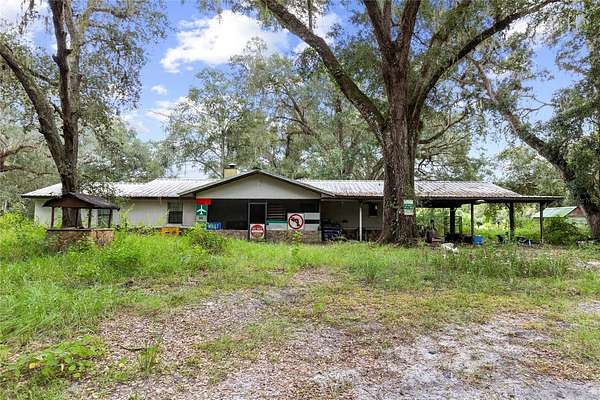 5.76 Acres of Land with Home for Sale in Webster, Florida
