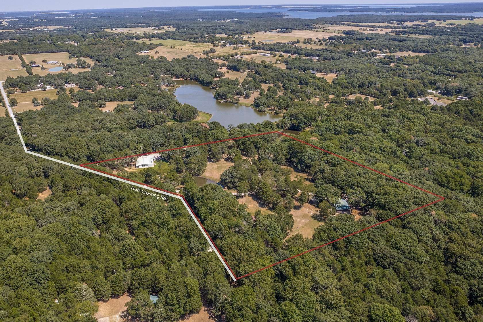 9.57 Acres of Land with Home for Sale in Sadler, Texas
