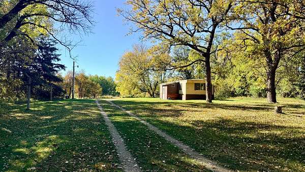 11 Acres of Recreational Land with Home for Sale in Park Rapids, Minnesota