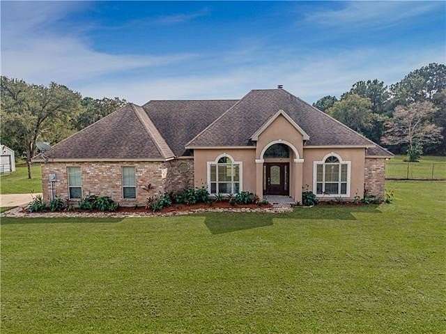 5 Acres of Land with Home for Sale in Lacombe, Louisiana