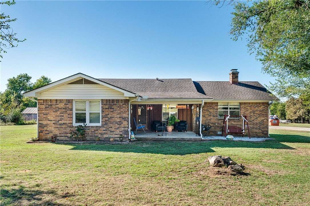 7.42 Acres of Land with Home for Sale in Siloam Springs, Arkansas