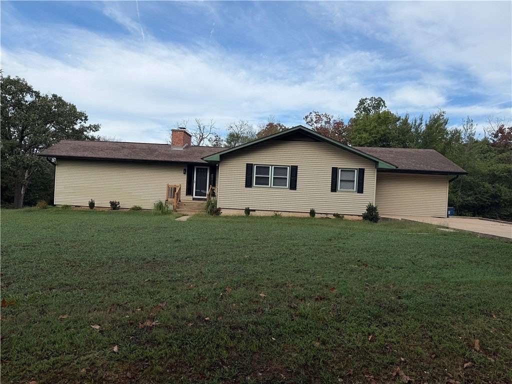 3.3 Acres of Land with Home for Lease in Gravette, Arkansas