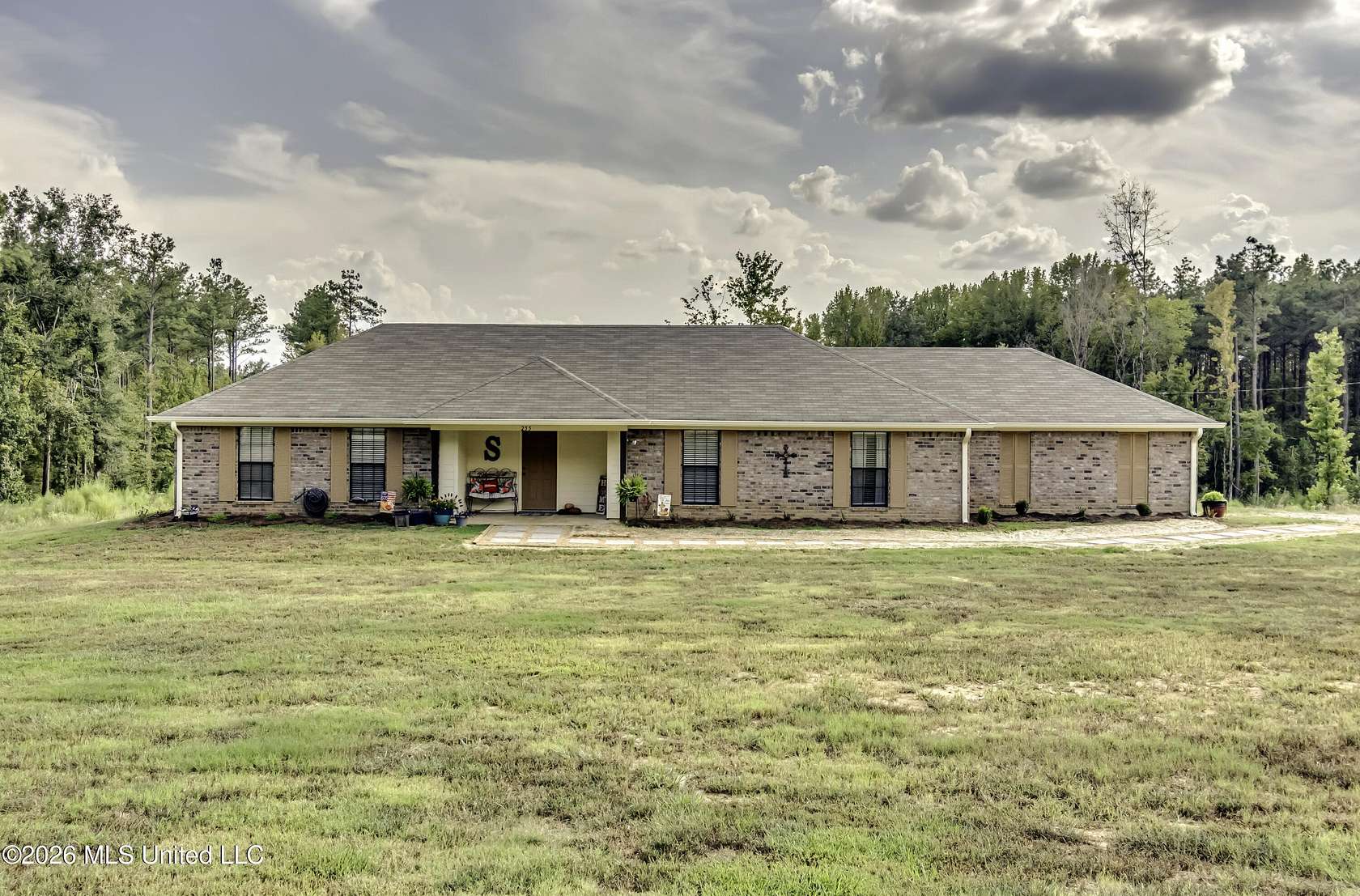 7 Acres of Land with Home for Sale in Flora, Mississippi