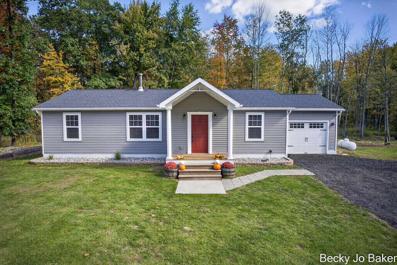 10 Acres of Land with Home for Sale in Coleman, Michigan