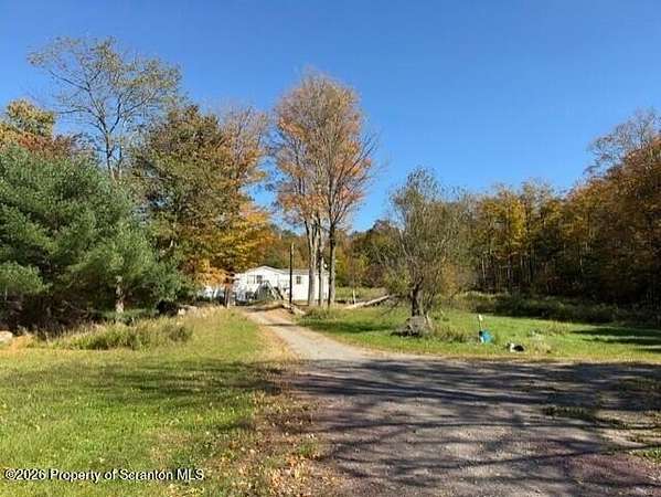 14 Acres of Improved Mixed-Use Land for Sale in Covington Township, Pennsylvania