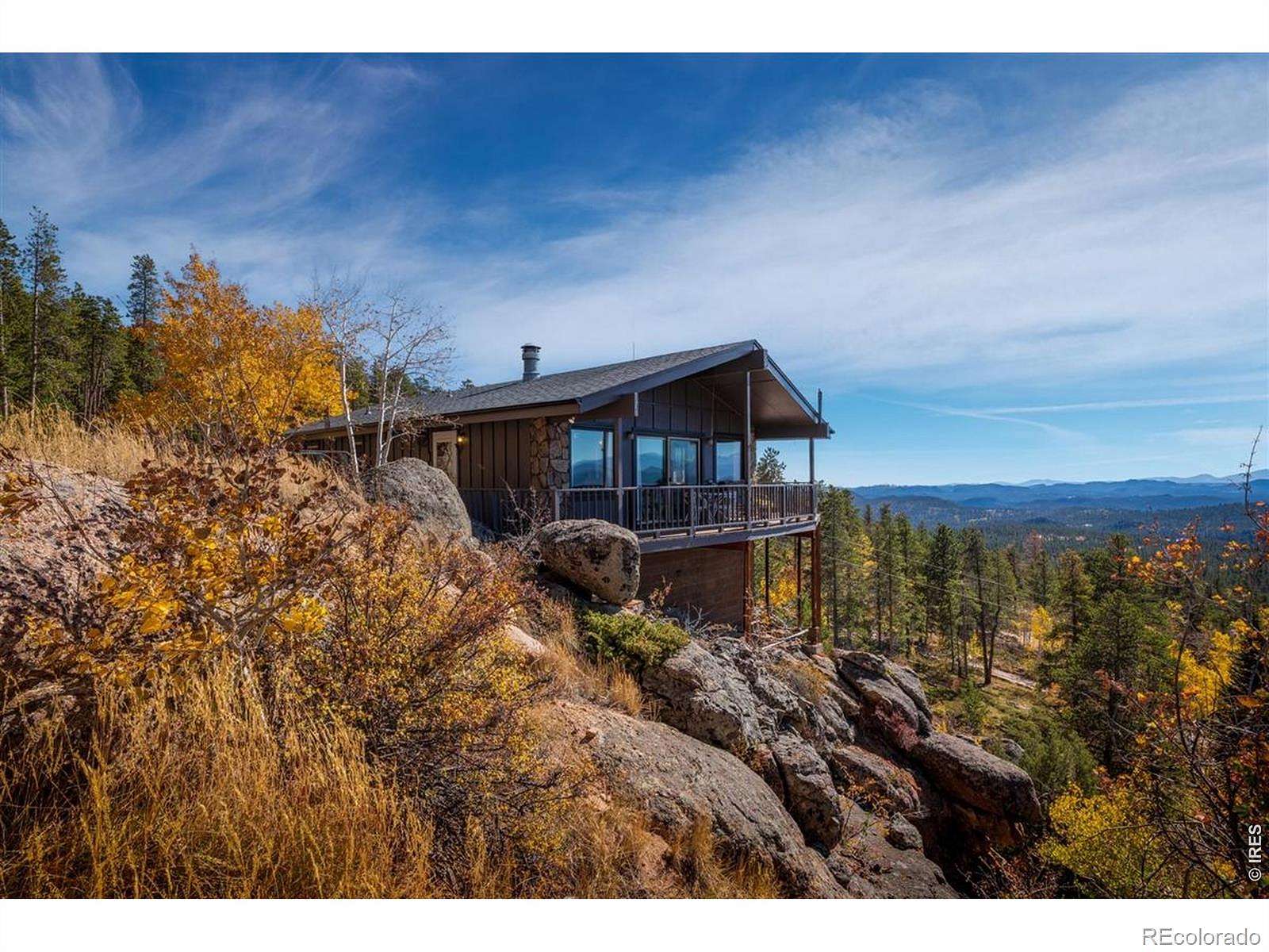 3 Acres of Land with Home for Sale in Red Feather Lakes, Colorado