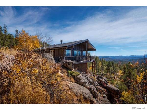 3 Acres of Land with Home for Sale in Red Feather Lakes, Colorado