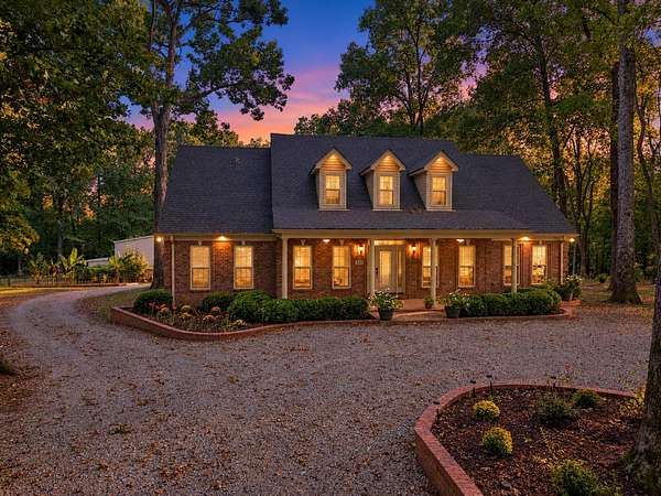 11.4 Acres of Land with Home for Sale in Millington, Tennessee
