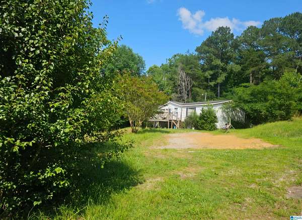 7.6 Acres of Land with Home for Sale in Margaret, Alabama