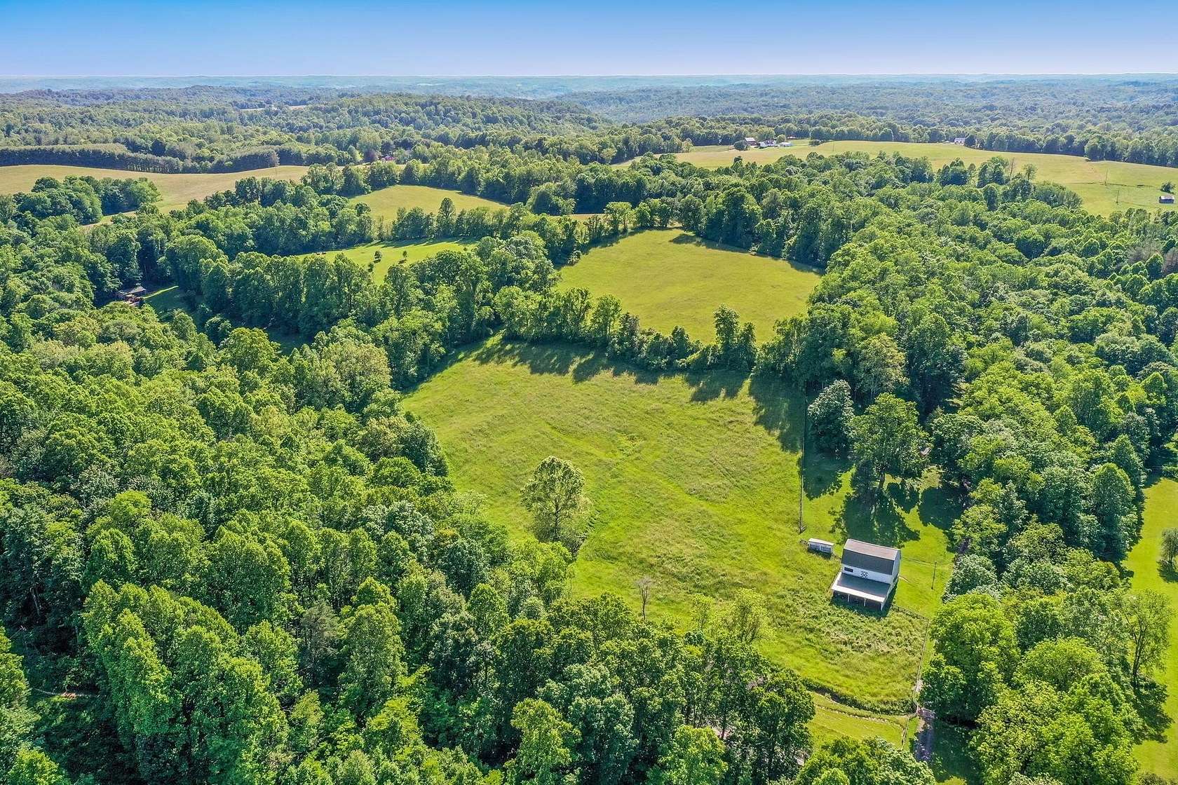 37.1 Acres of Land with Home for Sale in Logan, Ohio