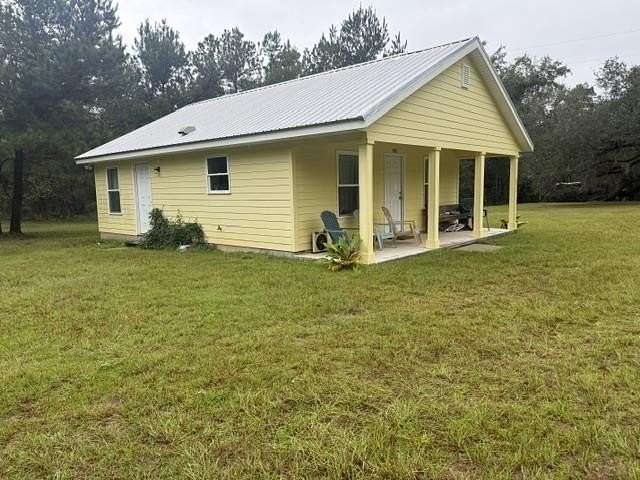 12.6 Acres of Recreational Land with Home for Sale in Madison, Florida