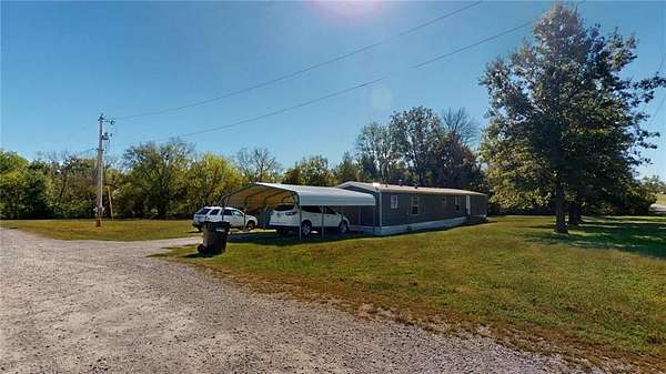 3.77 Acres of Land with Home for Auction in Nevada, Missouri