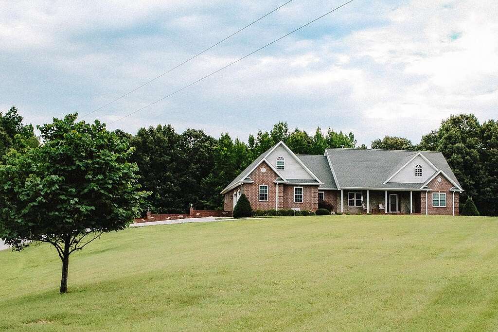 3 Acres of Land with Home for Sale in Puryear, Tennessee