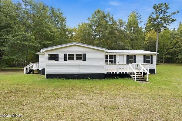 2.34 Acres of Land with Home for Sale in Haddock, Georgia