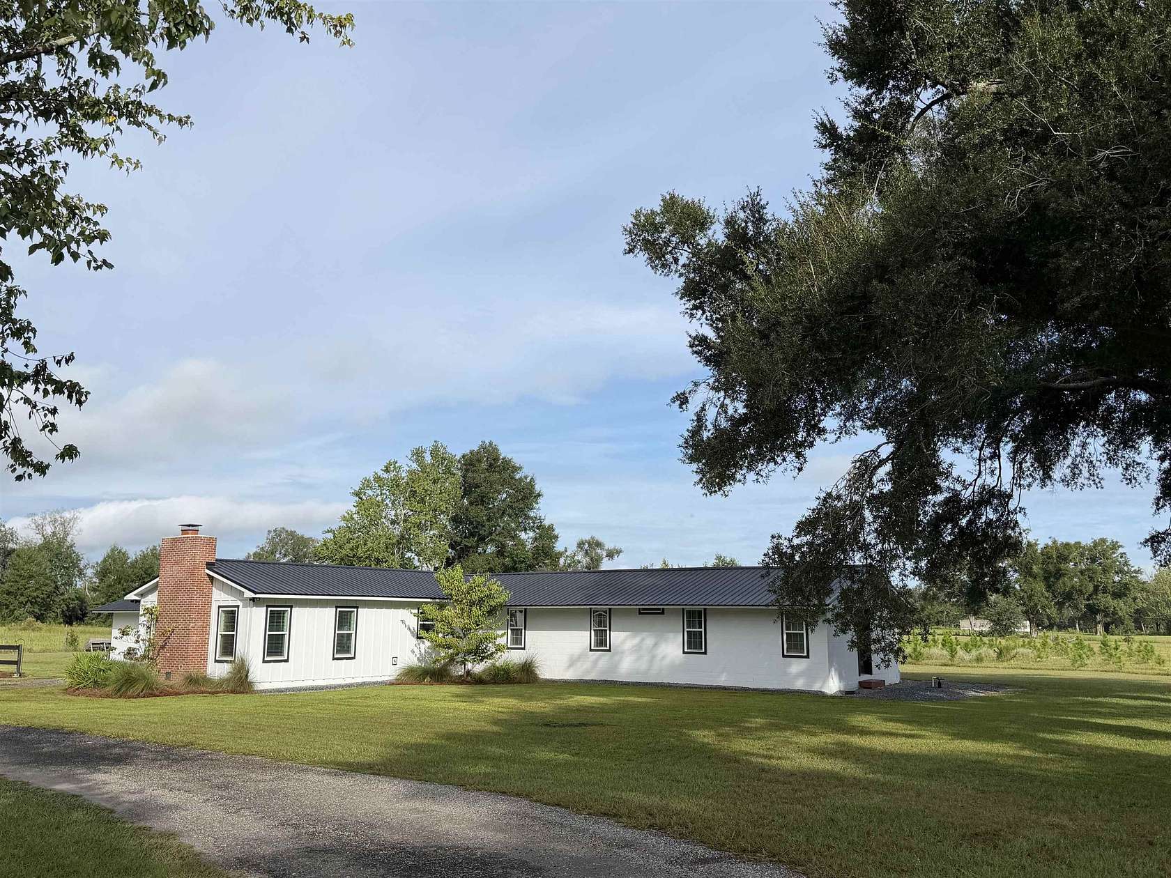 16.4 Acres of Land with Home for Sale in Lee, Florida