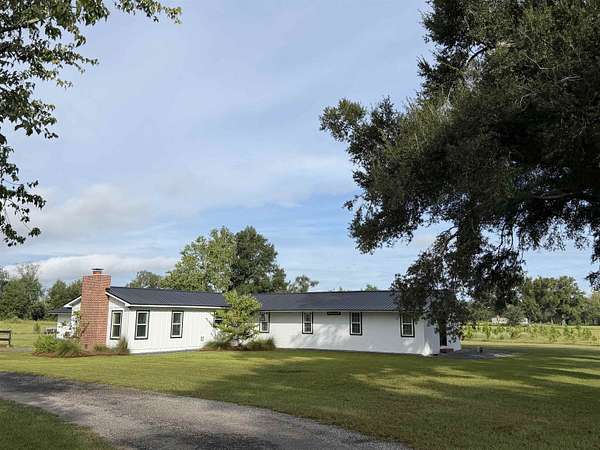 16.4 Acres of Land with Home for Sale in Lee, Florida