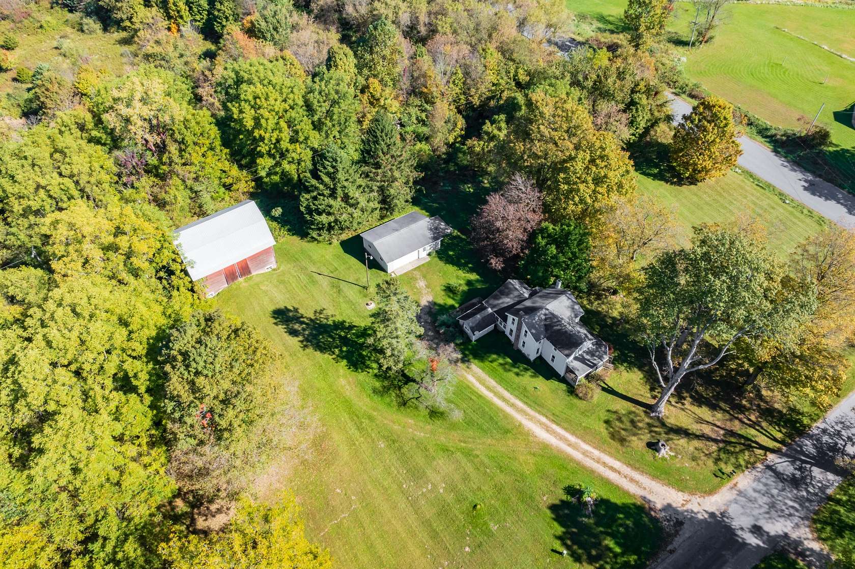 10.5 Acres of Recreational Land with Home for Sale in Lawrence, Michigan