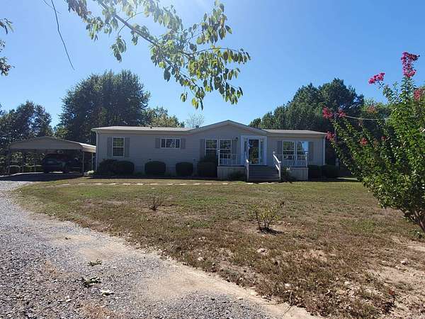 2.29 Acres of Land with Home for Sale in Mena, Arkansas
