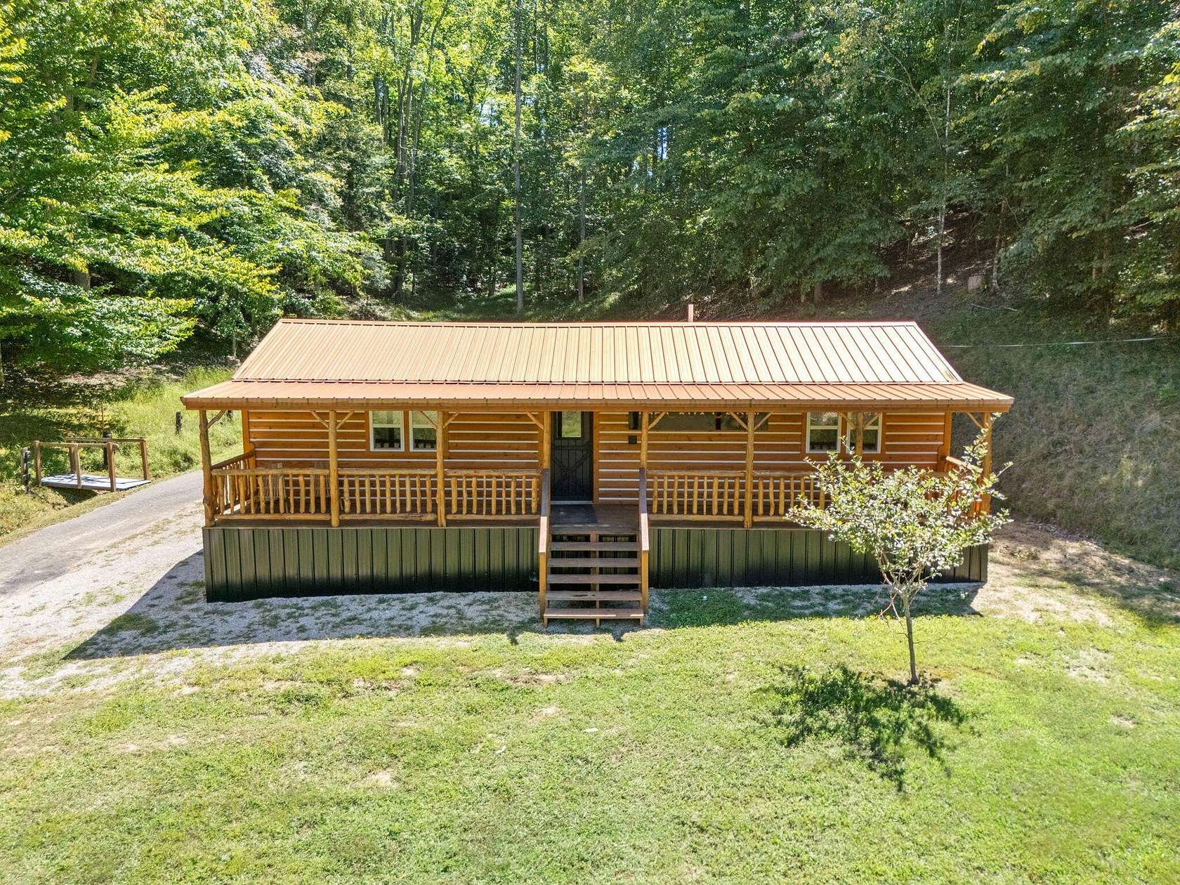 10.4 Acres of Land with Home for Sale in Campton, Kentucky