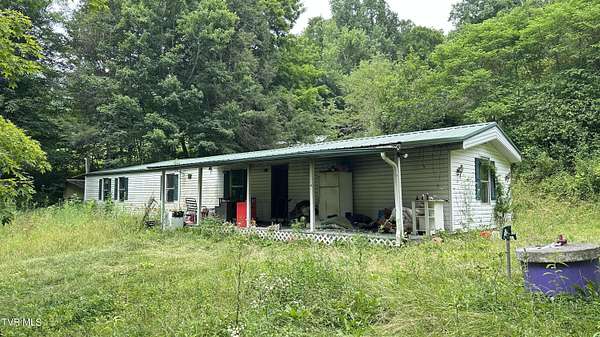 2.5 Acres of Land with Home for Sale in Butler, Tennessee