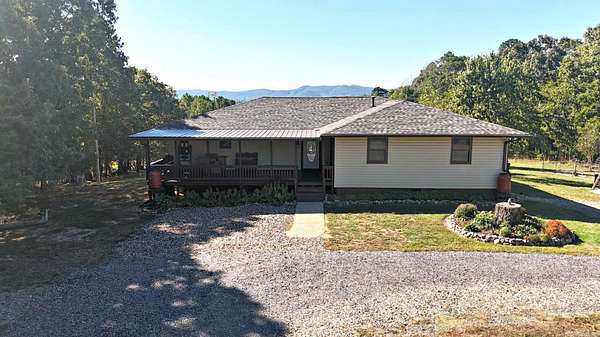 3.73 Acres of Land with Home for Sale in Mena, Arkansas