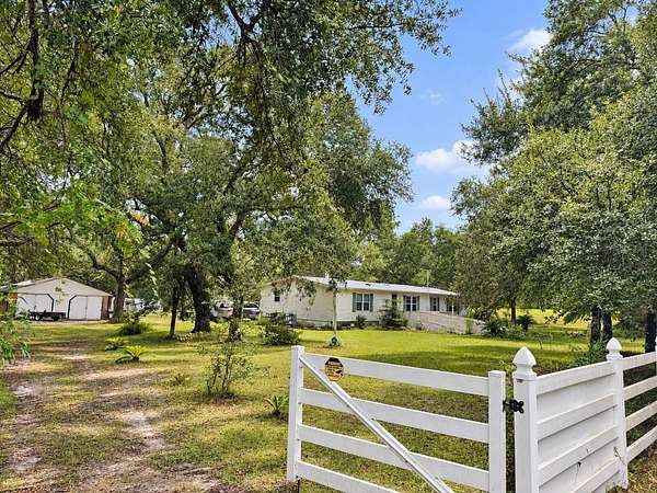 2.5 Acres of Land with Home for Sale in Dunnellon, Florida
