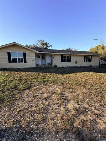4.43 Acres of Land with Home for Sale in Delight, Arkansas