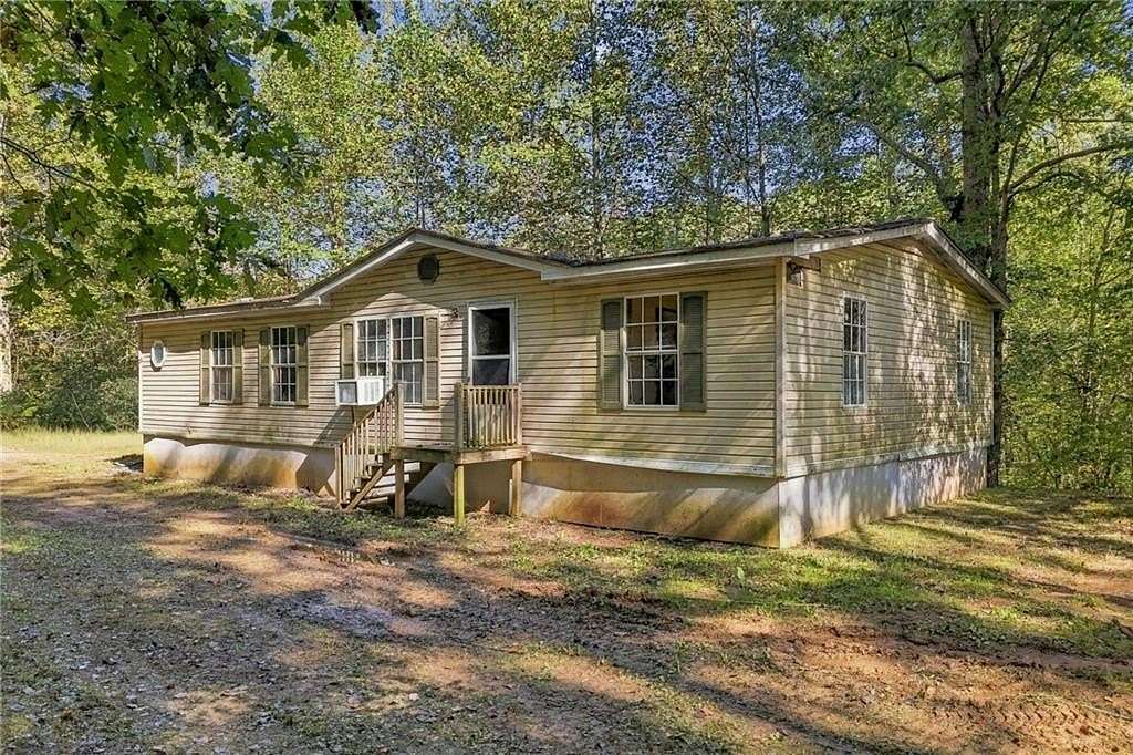 7 Acres of Land with Home for Sale in Ellijay, Georgia