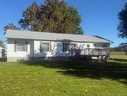 5 Acres of Land with Home for Sale in Revere, Missouri