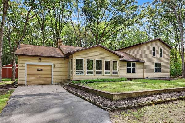 11.4 Acres of Land with Home for Sale in Fruitport, Michigan