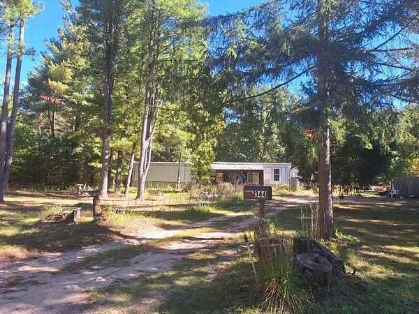 5 Acres of Land with Home for Sale in White Cloud, Michigan
