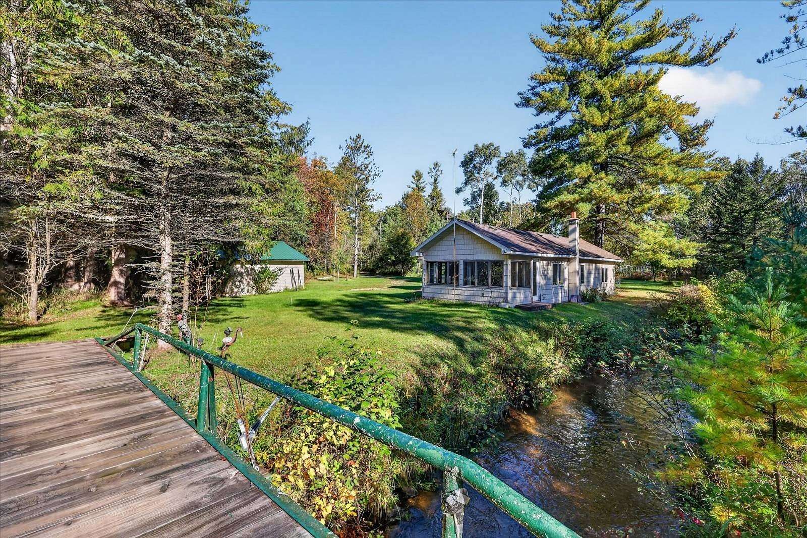 22 Acres of Recreational Land with Home for Auction in Chase, Michigan