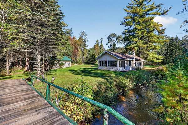 22 Acres of Recreational Land with Home for Auction in Chase, Michigan