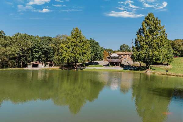12.4 Acres of Land with Home for Sale in Nelsonville, Ohio