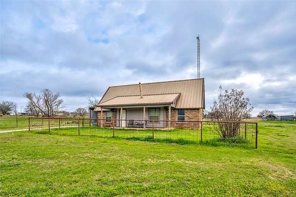 2 Acres of Land with Home for Sale in Covington, Texas