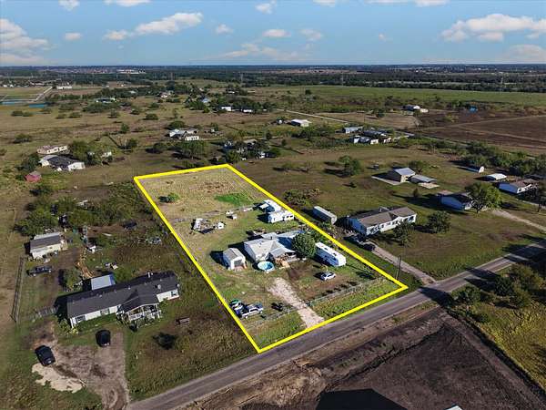 1.5 Acres of Land with Home for Sale in Royse City, Texas